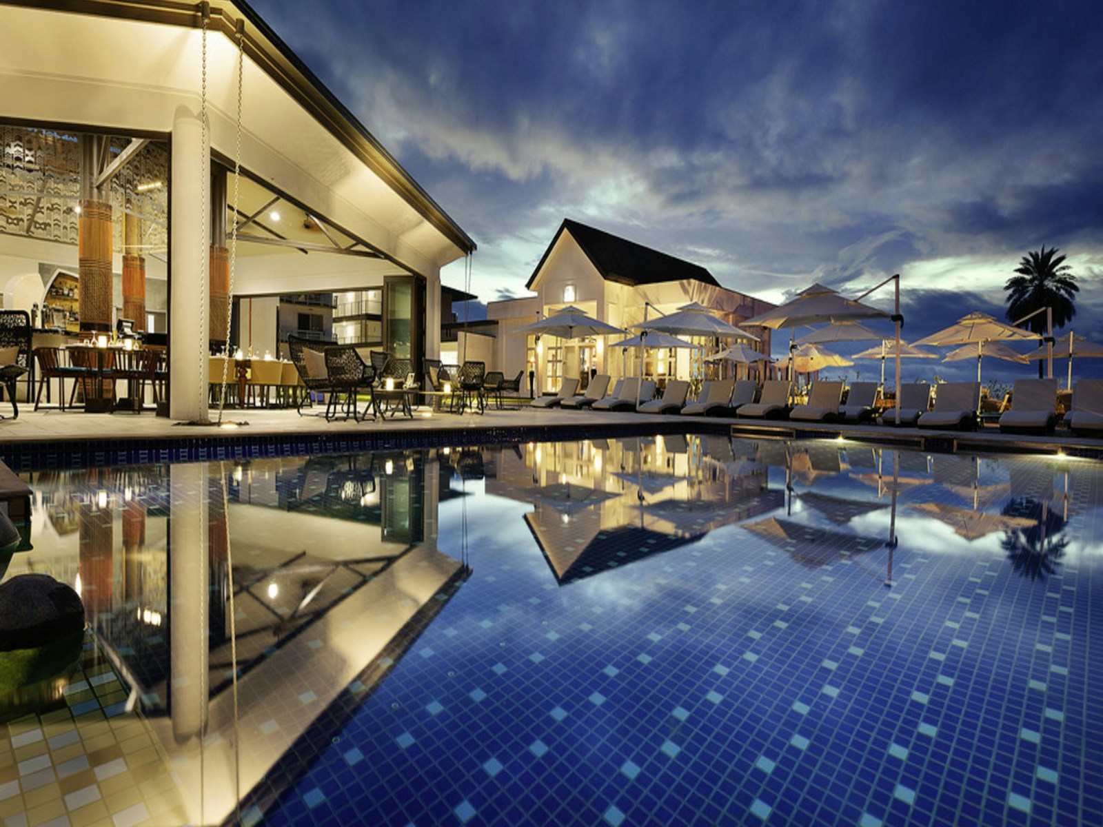 Infinity pool surrounded by palms